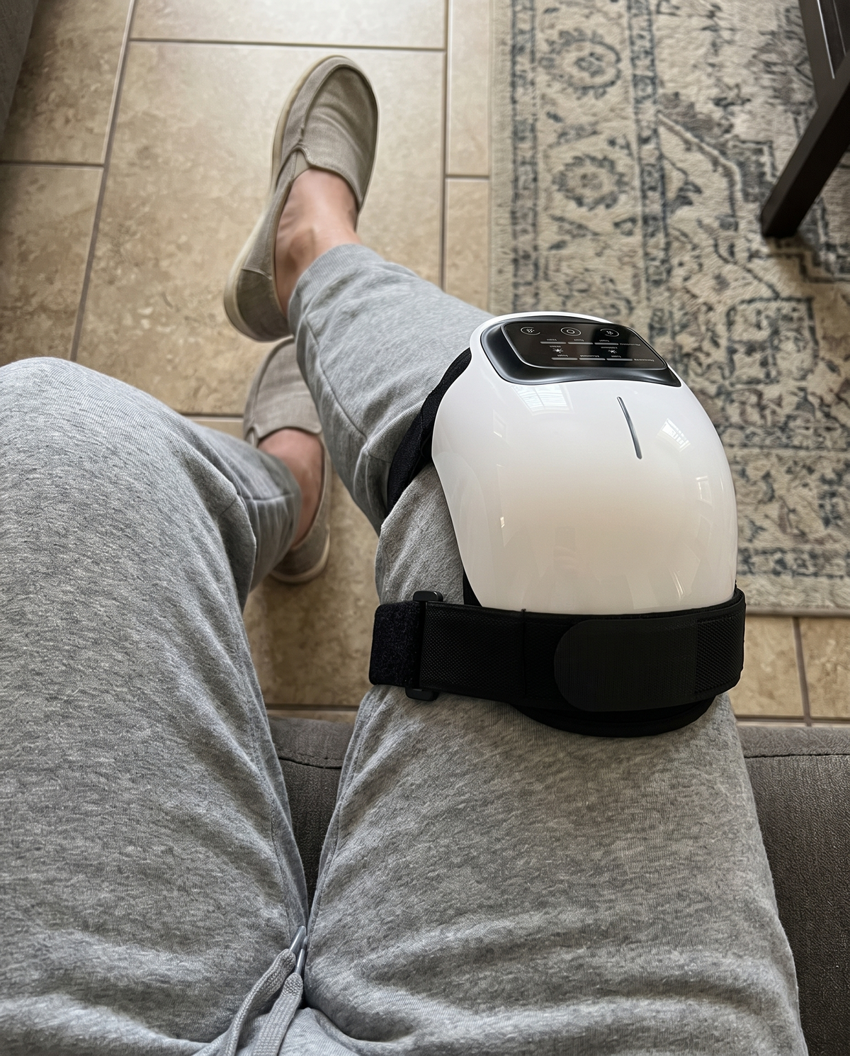 Overhead point-of-view of the ReMotion Knee Wrap worn on the knee
