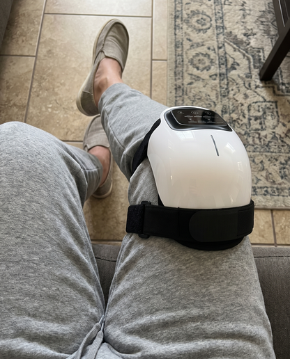 Overhead point-of-view of the ReMotion Knee Wrap worn on the knee